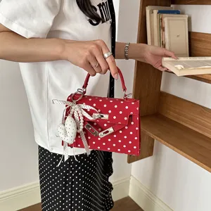 Red polka dot handbag with pearl heart pendant chic shoulder bag for women daily fashion style