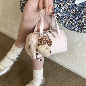 Pink patent leather boston bag with cute plush puppy pendant, stylish women casual handbag.