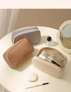 Simple corduroy cosmetic bag, large capacity portable makeup pouch for daily travel storage.