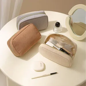 Minimalist corduroy cosmetic bag, large capacity travel makeup pouch for women and girls.