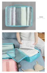 Detailed view of travel packing cube with mesh window, showing organized clothes inside.