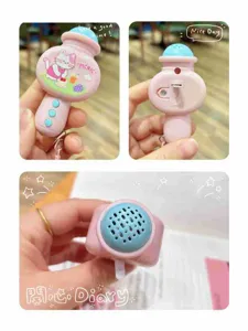 Mini cartoon recorder microphone keychain, cute pink electronic sound pendant gift for kids.