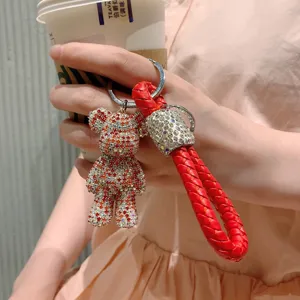 Portachiavi con orsetto in strass scintillante con cinturino intrecciato rosso per borsa auto