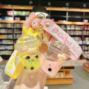 Llavero lindo de oso de té de burbujas líquido de dibujos animados para bolso de mujer genial.