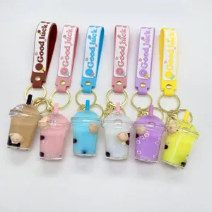 Lindo llavero de oso de té con leche boba flotante de dibujos animados para mujeres.