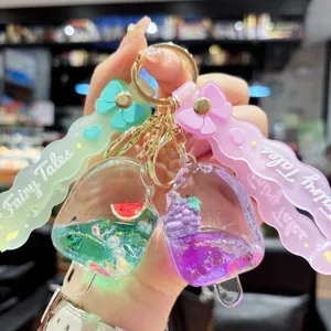 Cute liquid quicksand ice cream keychain pendant with bow ribbon for bags decoration