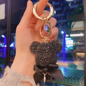 Black rhinestone bear keychain with bow and gold ring, luxury cute car key chain bag pendant.