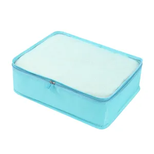 Portable travel packing cube for suitcase clothes sorting and organization in light blue.