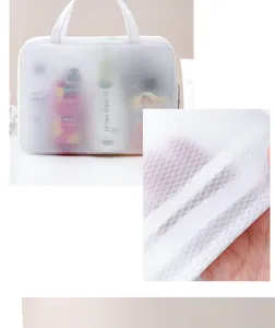 White waterproof EVA cosmetic bag detail, mesh travel toiletry organizer with portable handle.