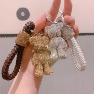 Portachiavi orsetto in strass brillante con cinturino intrecciato, ciondolo borsa.