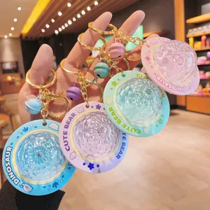 Portachiavi Creativo con Luce di Proiezione UFO Carino Ciondolo Lampada Notte Stellata in Plastica Novità Campanello Luminoso Decorazione Borsa