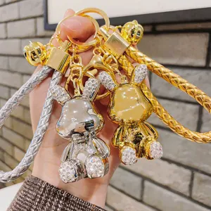 Portachiavi coniglietto in metallo strass con corda intrecciata, ciondolo borsa.