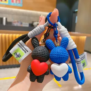 Cute cartoon resin heart rabbit keychain for stylish car keys and couple bag pendants accessory.