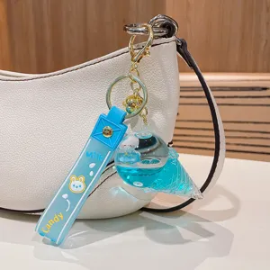 Cute floating liquid ice cream keychain with cute rabbit strap, bag pendant charm accessory.
