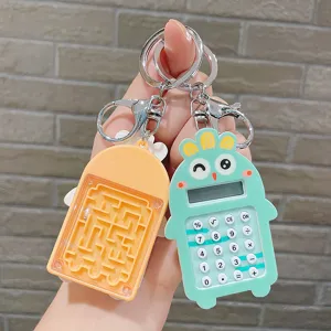 Llavero de calculadora de dibujos animados lindo y laberinto para bolso o llave de coche.