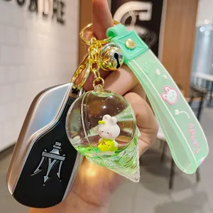 Creative oil-filled floating rabbit ice cream quicksand keychain car key bag pendant gift