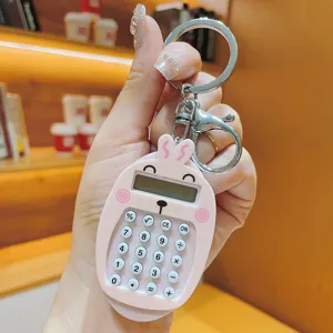 Lindo llavero de calculadora de conejo mini calculadora portátil colgante de bolso.