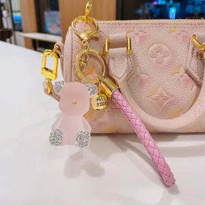 Exquisite jelly bear keychain with sparkling rhinestones, perfect bag charm and accessory.