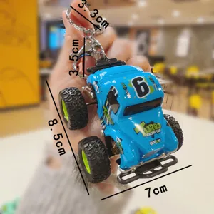 Mini off-road pull-back car keychain, cute metal vehicle key ring bag pendant gift.