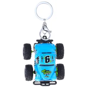 Blue mini monster truck keychain with metal ring and clasp, perfect car key accessory.
