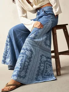 Women blue wide leg flare pants with ethnic floral side print bohemian style detail shot