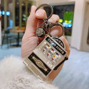 Porte-clés machine à sous en métal, pendentif créatif de console de jeu pour sac cadeau