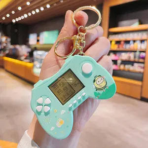 Cute mini handheld game console keychain, light green portable toy key chain gift for kids.