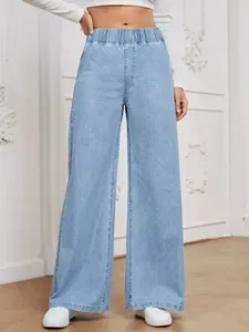 Comfortable women elastic waist light blue wide-leg jeans, stylish casual denim trousers.