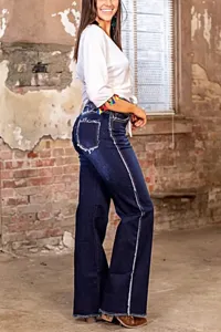 Jeans a zampa blu scuro da donna a vita alta con orlo sfrangiato pantaloni casual alla moda