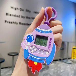 Niedlicher Rakete Astronaut Handheld Spiel Konsole Schlüsselanhänger Kinder Retro Spielzeug