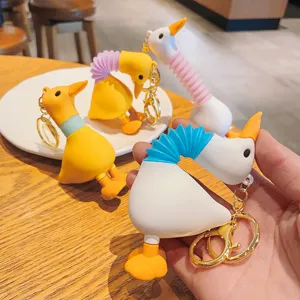 Cute telescopic long neck duck keychain stress relief bag pendant accessory detail view.
