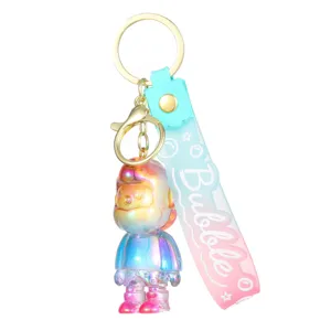 Cute gradient resin designer art toy keychain with letter strap, stylish bag pendant.