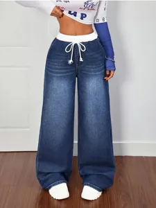 Pantalon large en denim extensible taille haute cordon mode casual voyage détails
