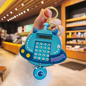 Llavero de calculadora de monstruo azul creativo, lindo colgante de silicona para bolso de estudiante.
