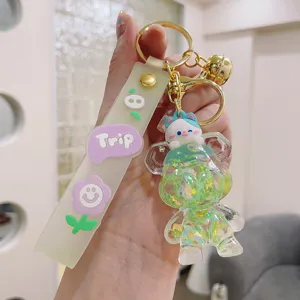 Cute liquid quicksand bear keychain with cat pendant and strap for daily decoration.