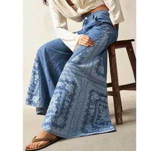 Women's blue wide-leg flare jeans with bohemian ethnic floral side print for daily casual wear.
