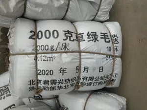 Thick grass green military style wool blanket bulk packaging for outdoor camping and rescue.