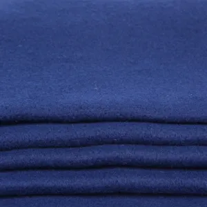 Dark blue thick wool blanket fabric detail, soft texture and warm material for outdoor camping.