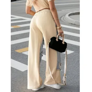 Women's casual straight-leg track pants with drawstring waist and trendy side denim splicing.