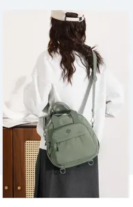 Mochila bandolera informal de nailon para mujer, bolso ligero de viaje en verde