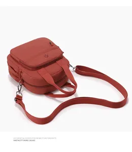 Bolso cruzado y mochila de nailon informal para mujer, bolso de viaje ligero con bolsillos.