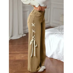 Casual wide leg loose fit denim jeans for women featuring stylish side ribbon lace up details.