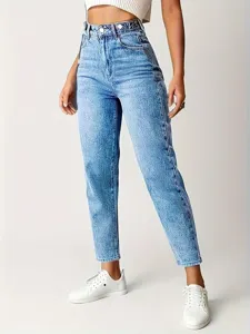 Detailed view of high-waisted light blue washed skinny jeans showcasing stretch denim fabric.