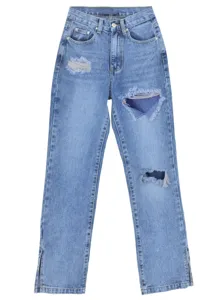 Close-up detail of light blue women straight denim jeans featuring trendy knee rips and slits.