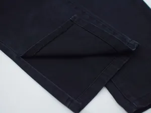 Close-up detail of dark straight pants hem and split design, premium fabric and neat stitching.