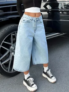 Mujer azul claro talle alto denim pierna ancha pantalón capri retro streetwear detalle