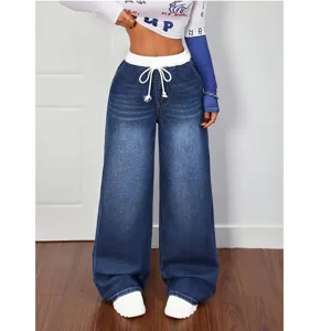 Jean large taille haute avec cordon de serrage pour femme, style casual chic.