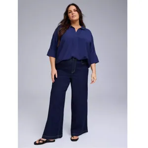 Plus size women's casual wide leg denim jeans and navy blouse outfit for daily fashion wear