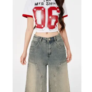 Women's vintage loose wide leg jeans and stylish washed denim pants set main view.