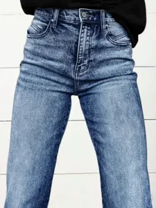 Women's high-waisted acid wash straight-leg jeans with classic pockets and metal button detail.